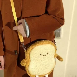 Le toast - sac à bandoulière en peluche