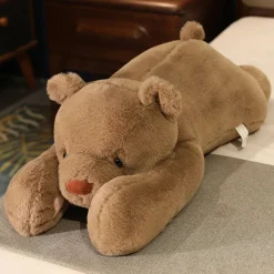 Ours en peluche géant brun et allongé