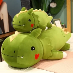 Peluche dinosaure avec un cœur sur la joue