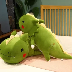 Peluche dinosaure avec un cœur sur la joue