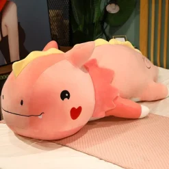 Peluche dinosaure avec un cœur sur la joue