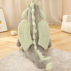 Peluche dragon doux assis