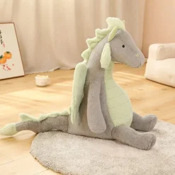 Peluche dragon doux assis