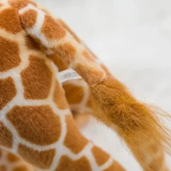 Peluche girafe douce et joyeuse