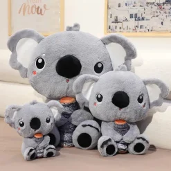 Peluche koala qui câline son bois