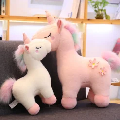 Peluche licorne blanche fleurie avec crinière arc-en-ciel