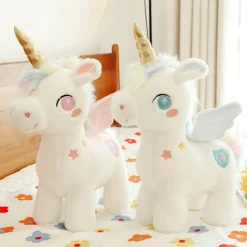 Peluche licorne blanche étoilée avec ailes et corne dorée