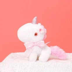 Peluche licorne miniature douce avec nœud et cornet pailleté