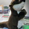 Peluche loutre mignonne aux yeux fermés