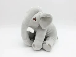 Peluche éléphant assis et content