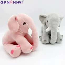 Peluche éléphant assis et content