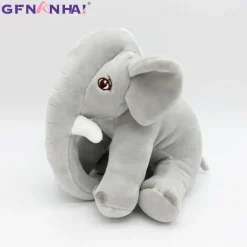 Peluche éléphant assis et content