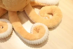 Peluche pieuvre contente et colorée