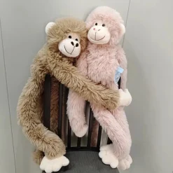 Peluche singe à câlins