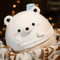 Peluche squishmallow ours blanc dans un bol