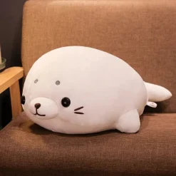 Peluche Squishmallow phoque blanc content
