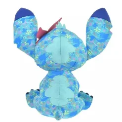 Peluche Stitch bleu clair avec une fleur rose