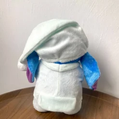 Peluche Stitch en pyjama bleu avec bonnet de nuit