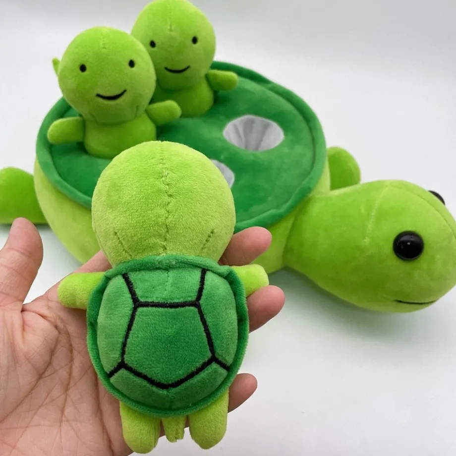 Peluche tortue verte avec ses bébés tortues
