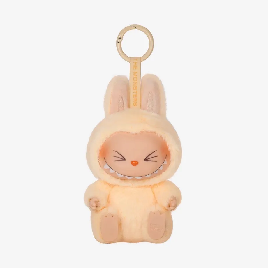 Peluche type Labubu assise boîte mystère