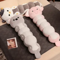 Peluche vache longue à câlins