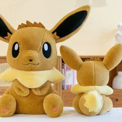 Peluche évoli pokémon assise toute douce