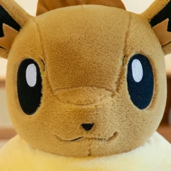 Peluche évoli pokémon assise toute douce